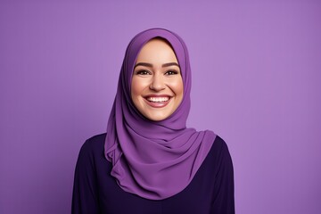 Beautiful Young Muslim Woman on a Purple Background for Internationals Woman Day