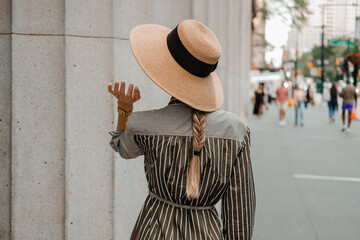 girl with hat on streets of new York manhattan soho summer style styling french braids hair inspo fashion lifestyle  - obrazy, fototapety, plakaty