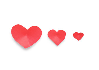 Red paper hearts on light background. Valentines Day celebration