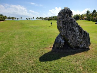 Caribbean Golf course with rock formation 