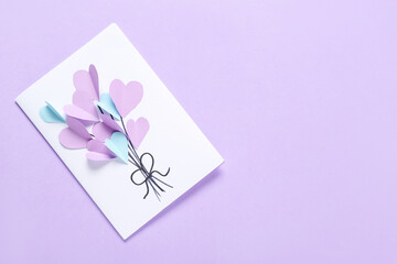 Beautiful greeting card for Valentine's Day celebration on lilac background