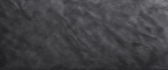 Monochromatic stone background banner with various shades of black and grey.