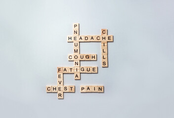 Crossword with the keyword pneumonia and other words meaning symptoms of the disease. Selective...