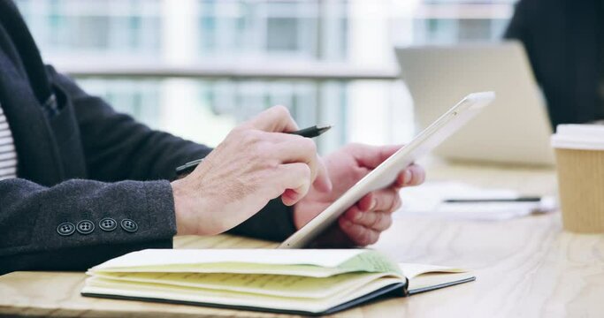 Business person, tablet and hands writing in research, meeting or notebook on desk at office. Closeup of employee journalist with technology and taking notes in book for online search at workplace
