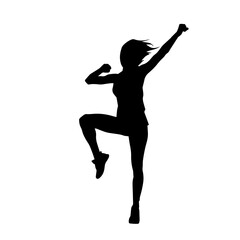 Silhouette of a slim female in dance pose. Silhouette of a woman dancing.
