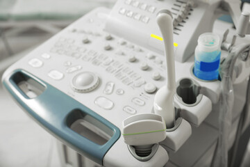 Fototapeta na wymiar Ultrasound control panel with ultrasonic transducers indoors, closeup. Medical equipment