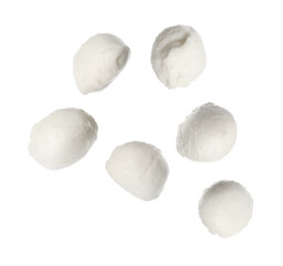 Fresh mozzarella balls falling on white background