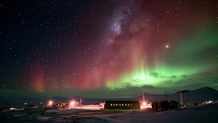 Visualize a stunning view of the Aurora Australis (Southern Lights) illuminating the night sky above a scientific base in Antarctica