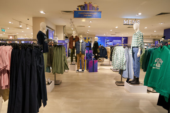 SINGAPORE - NOVEMBER 06, 2023: apparel displayed at Marks and Spencer store inside the Paragon shopping complex. Marks and Spencer is a major British multinational retailer