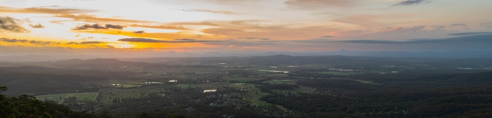 Fototapeta na wymiar Panoramic sunset views from the Hang Glider Launch and Lookout, Tamborine Mountain in Queensland, Australia