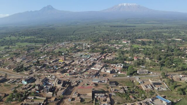 Tranquil African village at by Mount Kilimanjaro, Kenya, aerial panorama