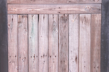 Old brown plank wood skin vertical on wall blank background
