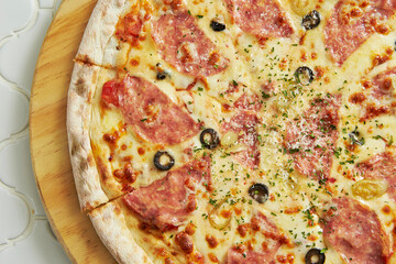 pizza with salami and cheese	