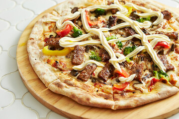 pizza on a wooden board