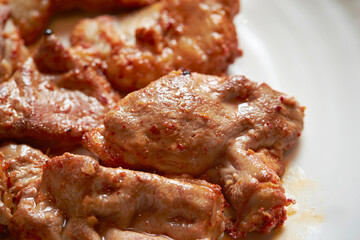 Grilled beef intestines on a plate	