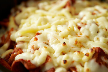 Cheese chicken ribs in a pan	