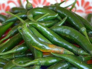 fresh hot chili peppers on the tray