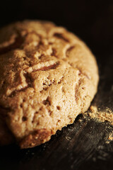 Whole wheat bread on black background