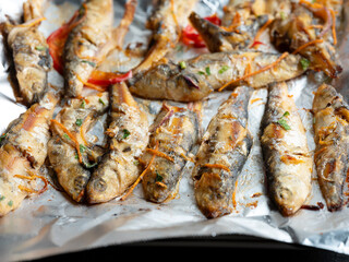 Seasoned fish on the grill	