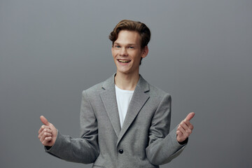 Confident Young Businessman Smiling in Studio - Professional Success and Happiness