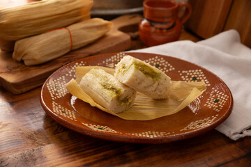 Tamales. Prehispanic dish typical of Mexico and some Latin American countries. Corn dough wrapped in corn leaves. The tamales are steamed.