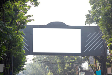 White blank led billboard screen for advertising above street in city.