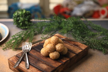 sesame balls Chinese famous food closeup with selective focus and blur