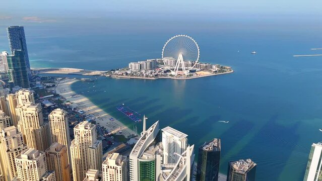 Aerial view of Dubai Marina. Dubai Marina is an affluent residential neighborhood known for The Beach at JBR.