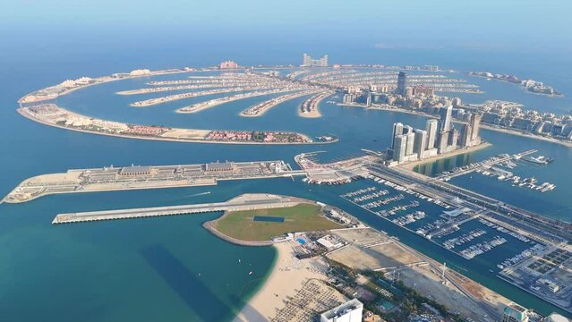 Aerial view of The Palm Islands consist of three artificial islands: Palm Jumeirah, Deira Islands, and Palm Jebel Ali, on the coast of Dubai.
