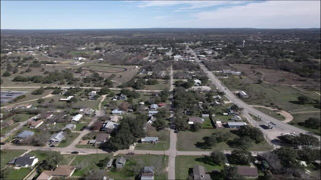 Aerial Shot over Johnson City, Texas and Hill Country, near highway 290