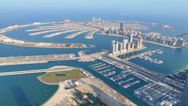 Aerial view of The Palm Islands consist of three artificial islands: Palm Jumeirah, Deira Islands, and Palm Jebel Ali, on the coast of Dubai.