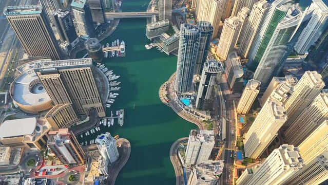 Aerial view of Dubai Marina. Dubai Marina is an affluent residential neighborhood known for The Beach at JBR.