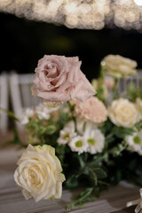 Conceptual wedding decoration. Inspirational. Dinner. Family gathering. Special moment a lifetime to remember. Long table. Table setting with arranged chairs. Flower arrangement for table.