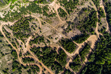 View from a great height of an old sand quarry converted into a motorcycle track