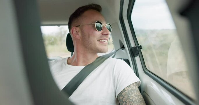 Man, car and road trip with laugh by window with thinking, ideas and comic memory for vacation travel. Guy, person and happy in vehicle with smile to remember funny story with driving on holiday