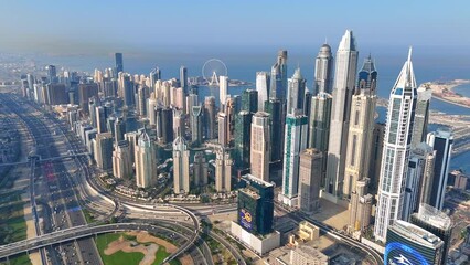 Aerial view of Dubai Marina. Dubai Marina is an affluent residential neighborhood known for The Beach.