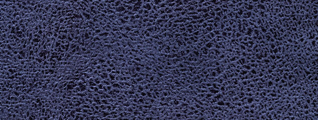 Navy blue background of fabric with wavy pattern, closeup. Velvet texture of seamless denim...