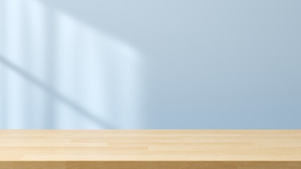 Empty space wooden table top on blue wall background with window sunlight. Mockup scene display for...