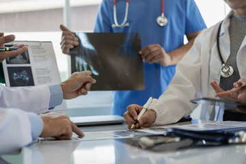 Meet with a doctor to find a cure for a patient and research medicine. Close-up. A doctor or...