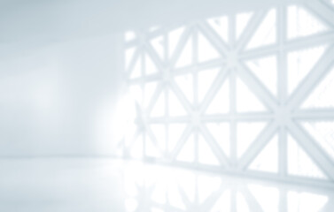 Abstract blurred modern workspace background, white modern indoor interior office or hospital with geometric light window with copy space. Blurry backgrounds for advertising and business presentation.