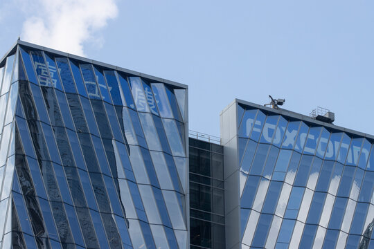 Shanghai, China - Oct 23, 2023: Exterior view of the Foxconn Shanghai headquarters building in China. Taiwanese electronics contract manufacturer Foxconn is one of Apple's largest suppliers.