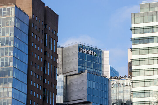 Vancouver, BC, Canada - Dec 23, 2023: Deloitte Summit, Deloitte's new BC headquarters in downtown Vancouver. Deloitte is the largest professional services network by revenue and one of the Big Four.