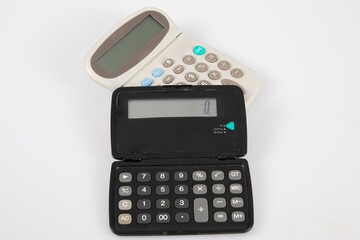 Calculator two models with a solar battery over grey white background