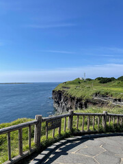 Clear skies, seas and cliffs. Meadows on the island. Beautiful natural scenery