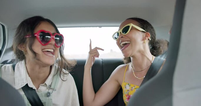 Car, singing and happy friends on a road trip, excited adventure and holiday with transport. Young women or gen z people in sunglasses for travel, vacation and dance with energy and laughing together