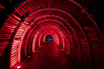 Entry tunnel to subterranean cathedral glows with spiritual light in the underground Catedral de...