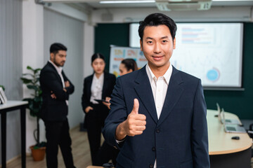 Fototapeta premium Asian business people team analyzing statistics financial. Team of businesspeople Meeting Conference Discussion Corporate Concept in office.
