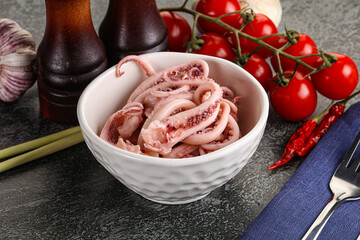Delicous marinated squid tentacles in the bowl