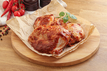 Marinated chicken leg in tomato sauce