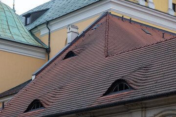Terracotta Tiled Roofs with Dormer Windows in Poznań, Poland